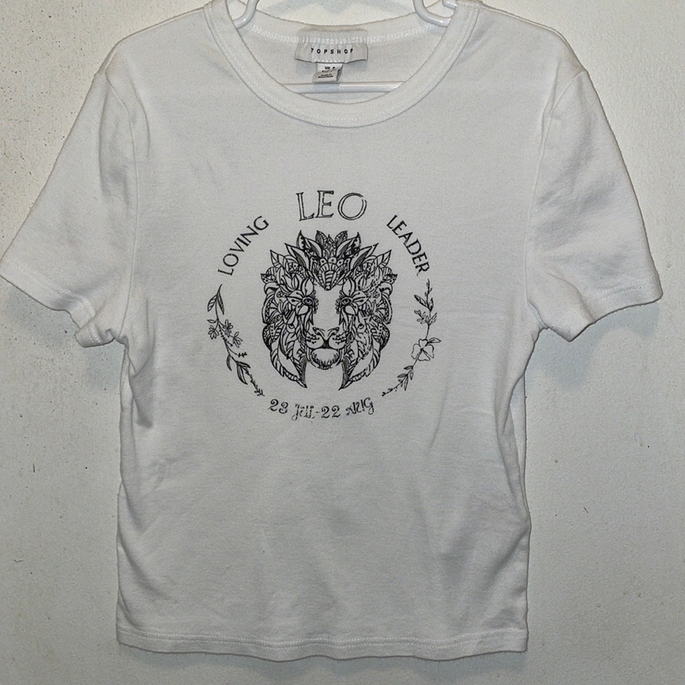 Top shop girls white “LEO” shirt- short sleeve- SZ 4 good condition
